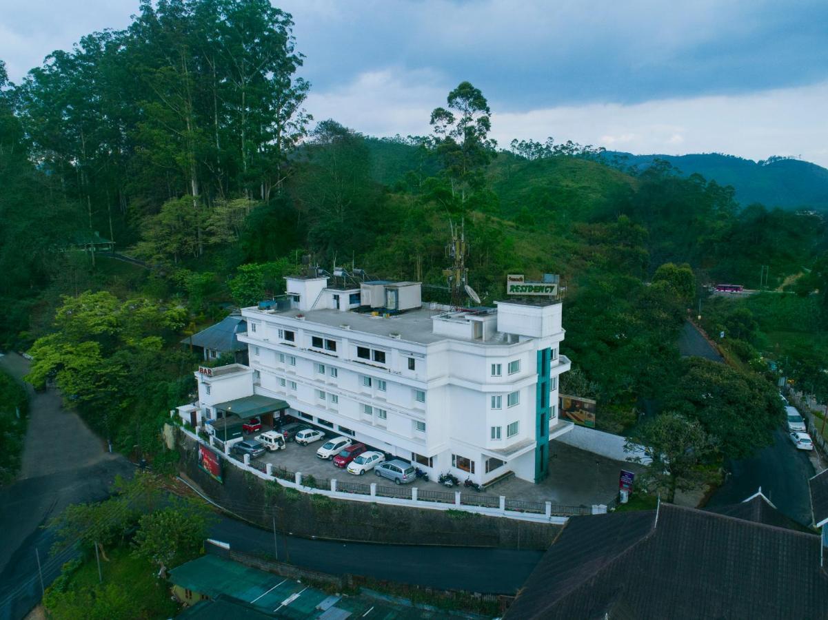 Hotel Issacs Residency à Munnar Extérieur photo