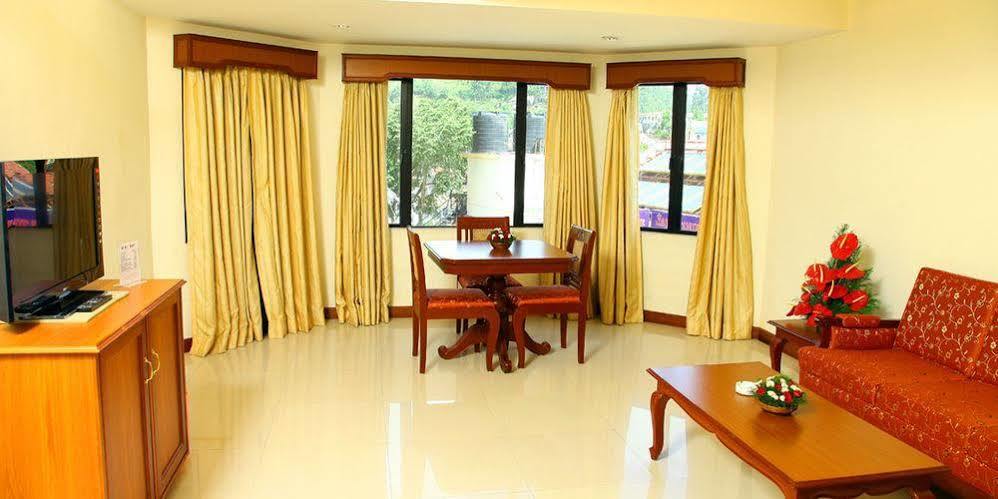 Hotel Issacs Residency à Munnar Extérieur photo